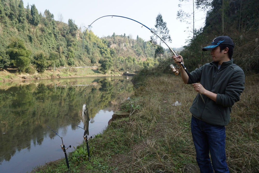 Automatic Fishing Rod High Quality Fish Pole 1.8M 2.1m 2.4m 2.7m  Sea River Lake Stainless Steel Fishing Rod spinning telescopic